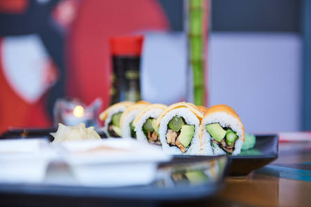 Sushi with avocado and kale on plate with wasabiの写真素材