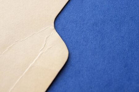 Yellow and blue craft paper texture. Concept of river and bank, sea and coastの写真素材