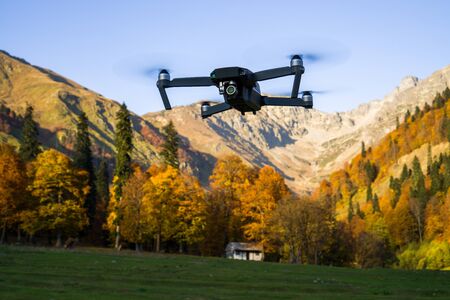 Drone against a backdrop of mountain peaks. Alpine meadow. Abkhazia. Georgia.の写真素材