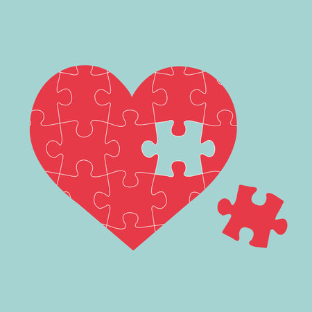 Heart from puzzle pieces. Vector illustration. Isolated on blue background.のイラスト素材