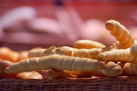 bread in the form of cross in the basketの写真素材