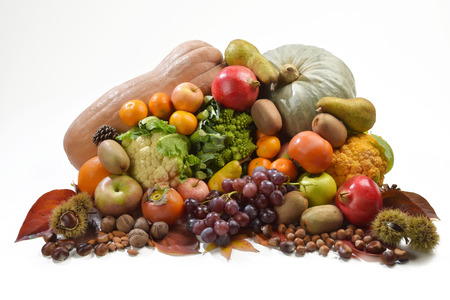 heap of fruits and vegetables, autumn and winter. The background is white