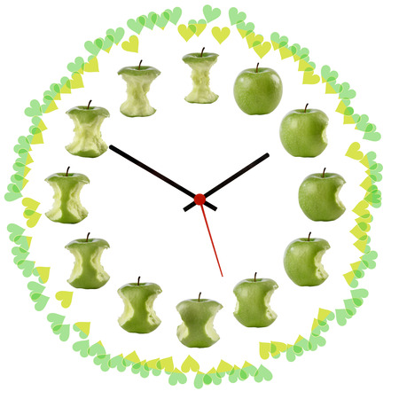Clock green apple with little heartsの写真素材