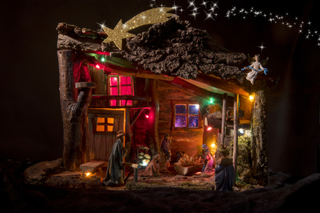 handmade nativity scene with lights and starsの写真素材
