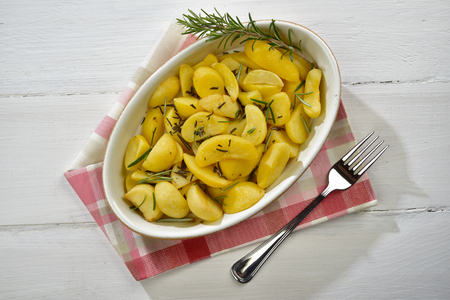 Potatoes baked in to a oval bowlの写真素材