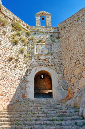 Nafplio - The  Palamidi castle  Nafplio is a seaport town in the Peloponnese in Greece that has expanded up the hillsides near the north end of the Argolic Gulfの写真素材