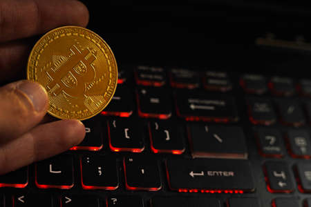 Bitcoin gold cryptocurrency on the keyboard