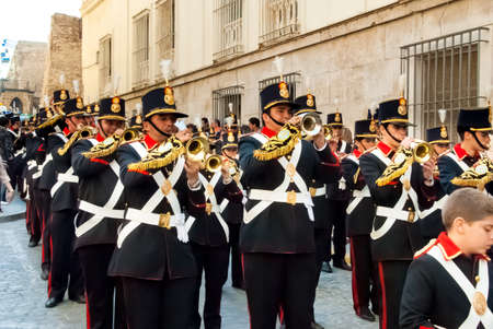 Orchestra walking ahead of procession in Holy Week, traditional, spanish Eastern procession.のeditorial素材