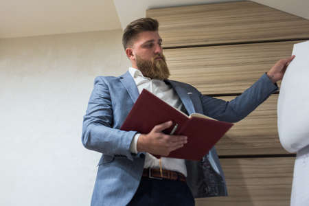 Businessman in office late night workの写真素材