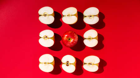 Large fresh red apple on red background gala schnico brookfield mema devil mustの写真素材