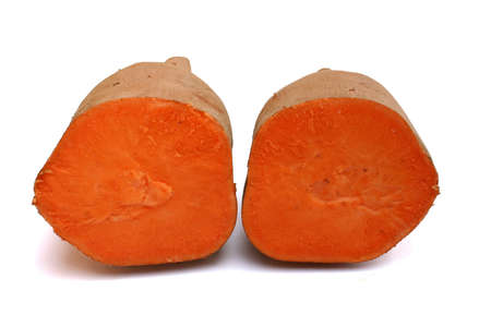 Two halves of a cut sweet potatoの写真素材