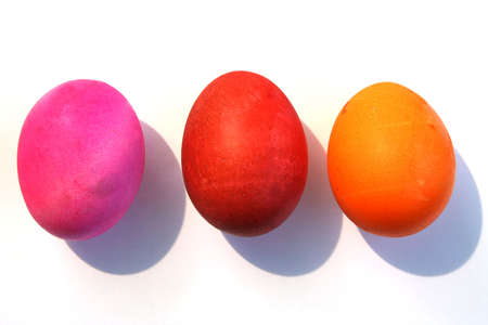 Three bright and colorful Easter eggsの写真素材