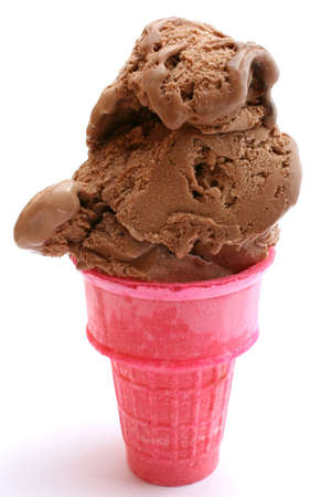 chocolate ice cream in a pink coneの写真素材