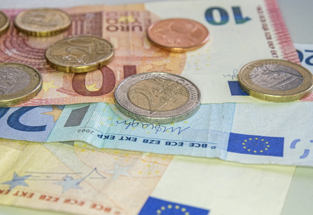 Close up shot of a bunch of money on a deskの写真素材