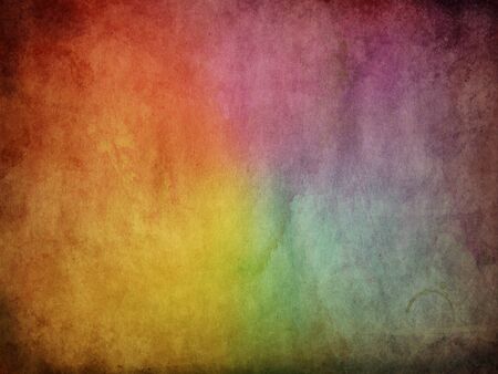 Old stained paper with multi coloured middle