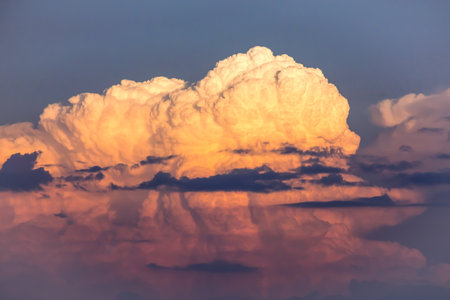 Orange clouds on blue sky before a summer storm in Minnesota USA