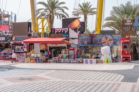 Shops selling drinks, toys and misc. items on the promenade in Eilat, Israelのeditorial素材