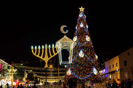 Haifa, Israel 12-06-2021 Holiday display representing the three major religions with the Bahai...