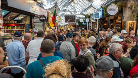 Jerusalem, Israel 11-24-2021 Busy Mahane Yehuda Market full of people buying and selling goods in Jerusalem, Israelのeditorial素材