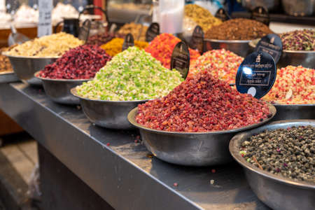 Jerusalem, Israel 11-24-2021 Translation World full of Grinders Apple Cider Different kids of drink infusions at Mahane Yehuda market in Jerusalem, Israelのeditorial素材