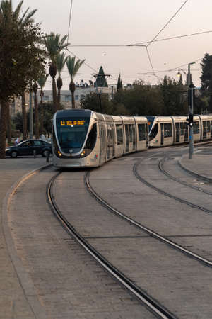 Jerusalem, Israel 11-22-2021 The modern gray Jerusalem light rail car traveling in Jerusalem, Israelのeditorial素材