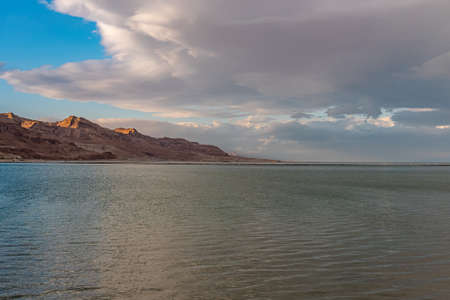 The brilliant colors of the Dead Sea and the clouds on a Winter's day in Israel.の写真素材