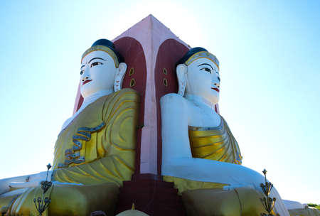 Kyaikpun Pagoda - the four seated Buddha, sitting back to back to four directions in the city of Bago, Myanmarの写真素材