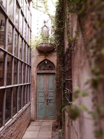Wooden door of an ancient houseの写真素材