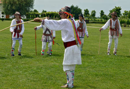 Traditional Romanian male wear (ia) on dancers performingのeditorial素材