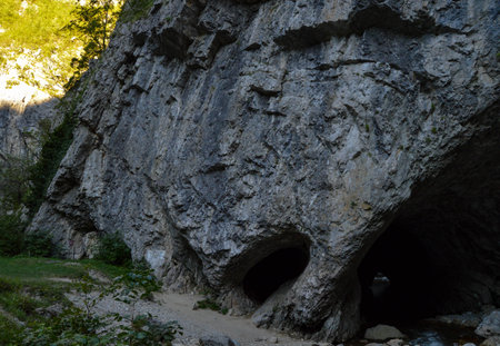 Pestera de la nara - old natural cave, Spectacular river tunnel at Sohodol Gorges(Cheile Sohodolului), Valcan mountains, in Gorj county, Romaniaの写真素材