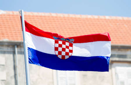 The flag of Croatia on blue sky , sunny dayの写真素材