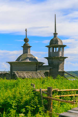 Old wooden Church in the village in the summerの写真素材