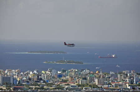 Twin Otter Seaplane And The City