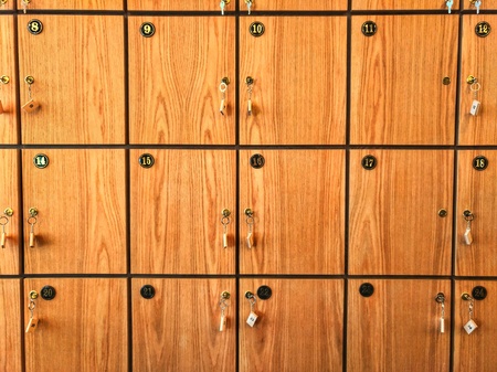 Background of lockrooms. With keys and numbers.の写真素材