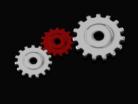 3d pinions isolated on blackの写真素材
