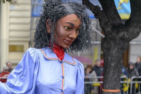 Nice - February 23: Female Entertainer in carnival Costum at the Nice Flower Carnival on February 23, 2013 in Nice, Franceのeditorial素材