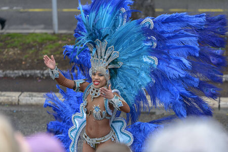 Nice - February 23: Female Entertainer in carnival Costum at the Nice Flower Carnival on February...