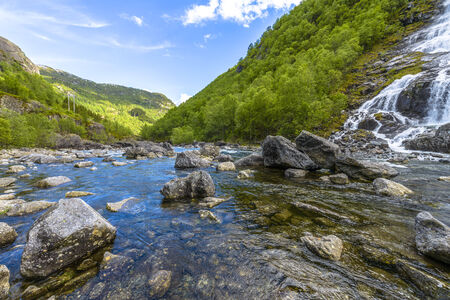 Flesana waterfall in spring in Norwayの写真素材