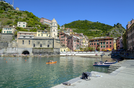 Vernazza, Italy- May 21, 2016: tourists enjoying various activities in Vernazza, one of the five towns that make up the Cinque Terre region on May 21, 2016 in Vernazza, Italyのeditorial素材