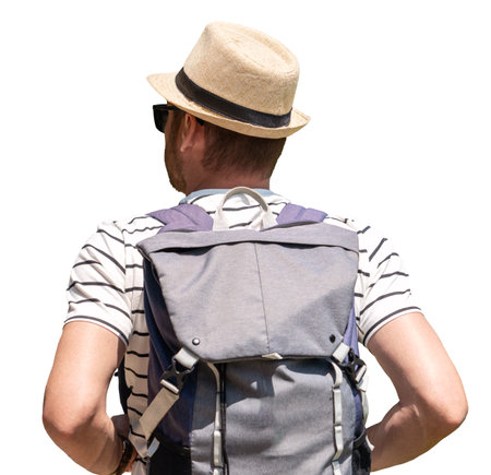 Isolated on the white background man traveler with backpack wearing straw hat and sunglasses, rear view photo.の写真素材