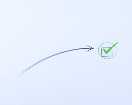 Curved hand-drawn arrow leading to a checked box on white background. Minimal concept of goal,...