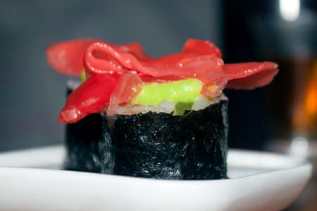 Sushi with ginger and wasabi in a square plateの写真素材