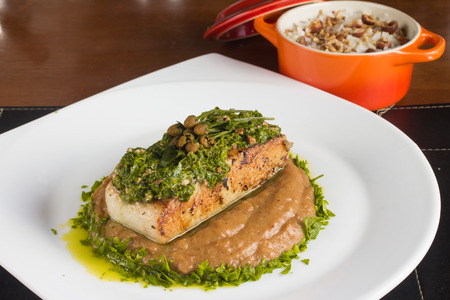 Gourmet Fish Fillet with smash banana, cabbage and herbsの写真素材