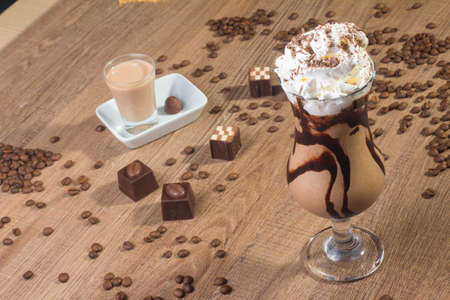 Iced Coffee Dessert with whipped cream and cocoaの写真素材