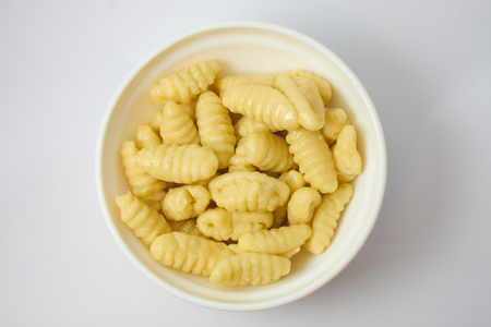 Gnocchi into the pot ready to serveの写真素材