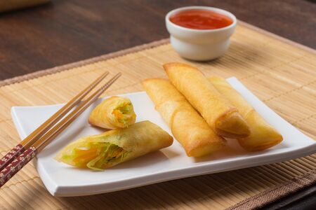 Traditional Japoneses Harumaki. Vegetables Springroll with sauce