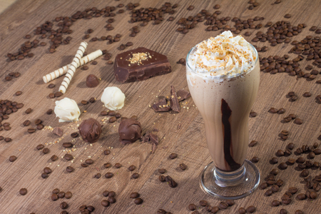 Iced Coffee Dessert with whipped cream and cocoaの写真素材