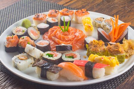 Traditional Japonese Food with sushi, sashimi and rollsの写真素材