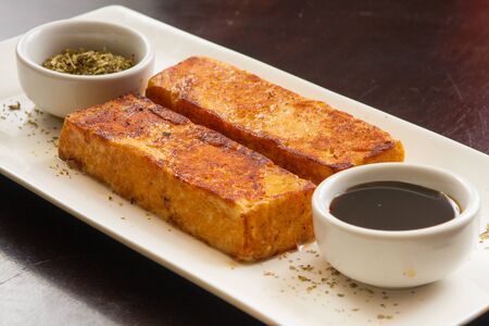 Traditional Brazlian Coalho Cheese with melado and herbsの写真素材