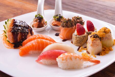 Traditional Japonese Food with sashimi, rolls and sushiの写真素材